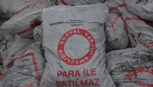 Suriyeliler kömür yardımlarını satmaya başladı